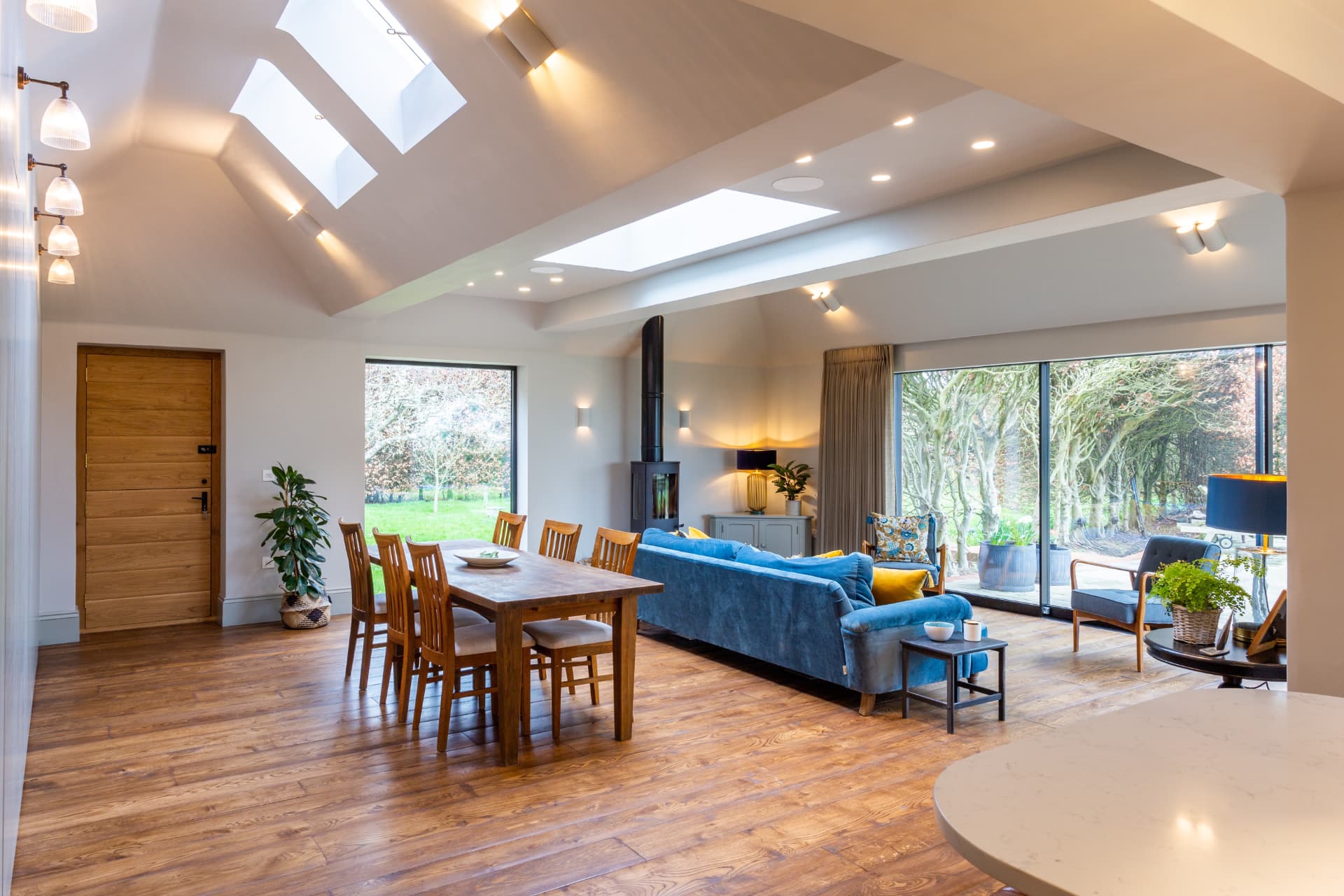 Newly installed wooden floor in a bright open-plan living space